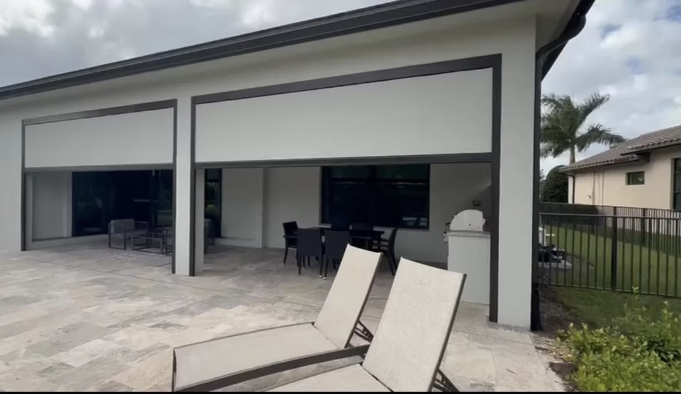 Recent motorized patio screen installation by Camacho Blinds 13
