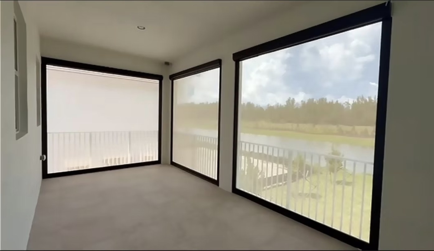 Recent motorized patio screen installation by Camacho Blinds 5