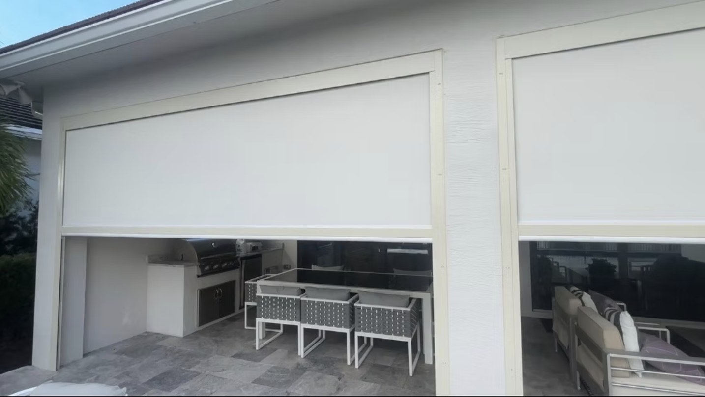 Recent motorized patio screen installation by Camacho Blinds 10