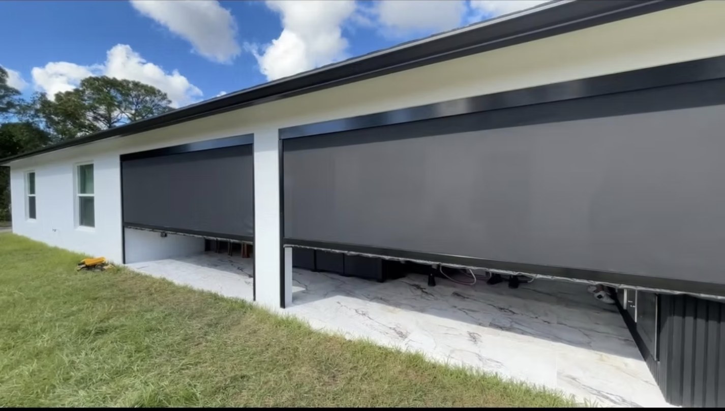Recent motorized patio screen installation by Camacho Blinds 2