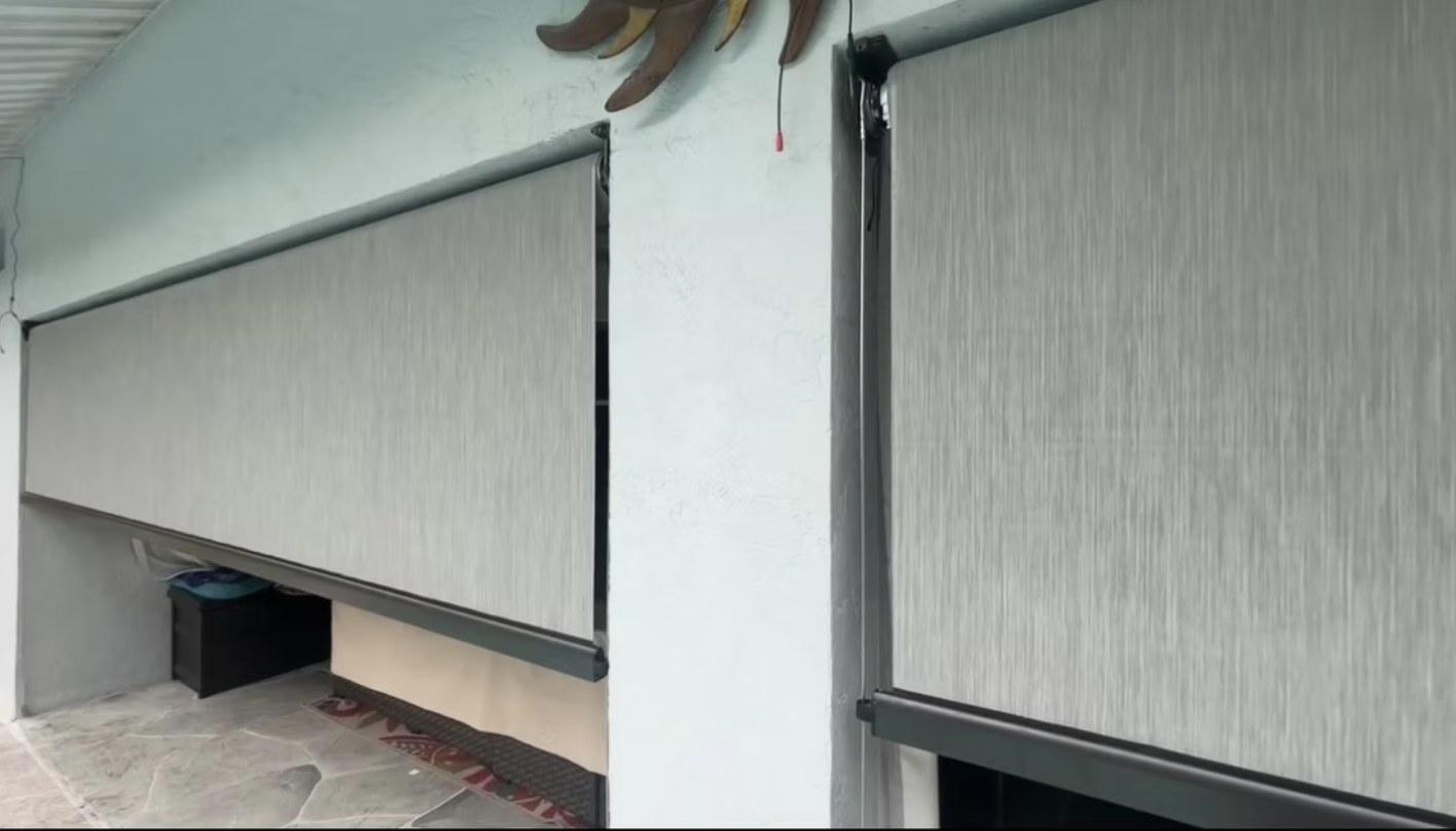 Recent motorized patio screen installation by Camacho Blinds 6