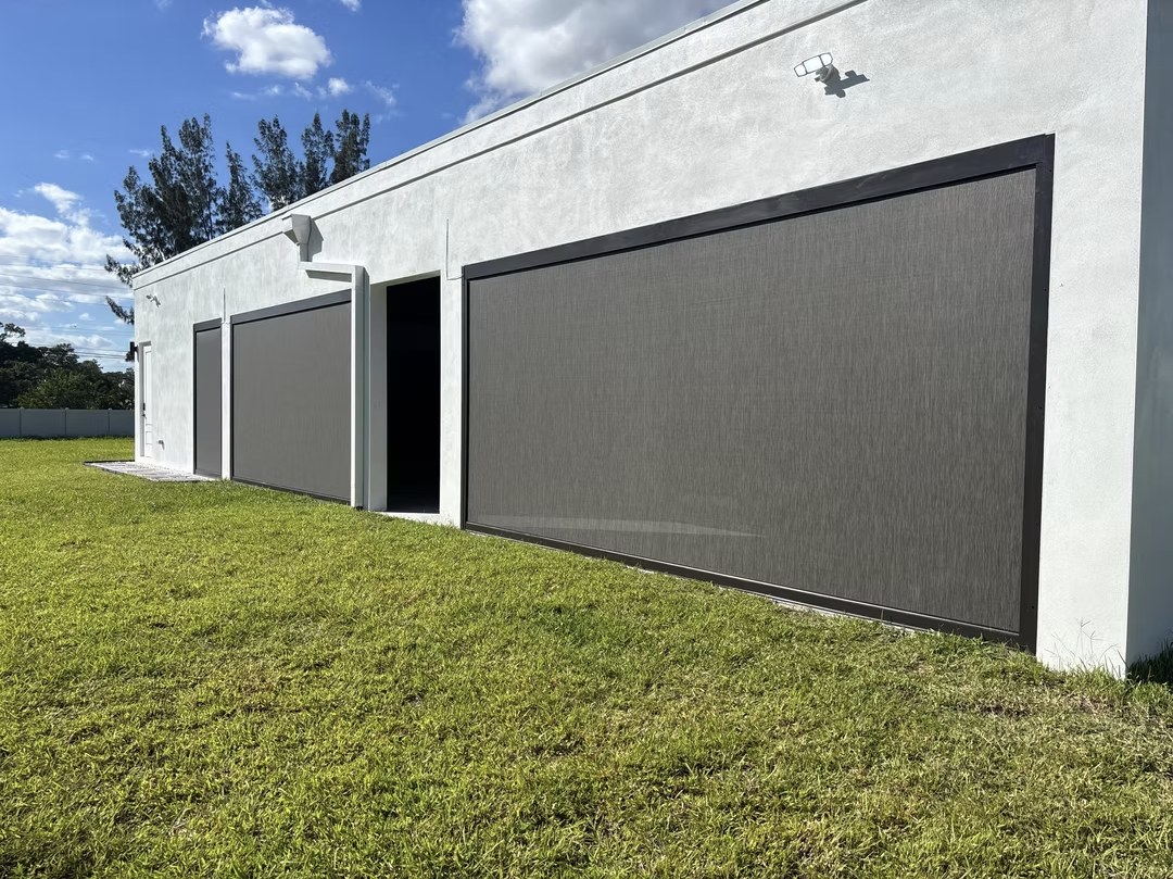 Recent motorized patio screen installation by Camacho Blinds 8
